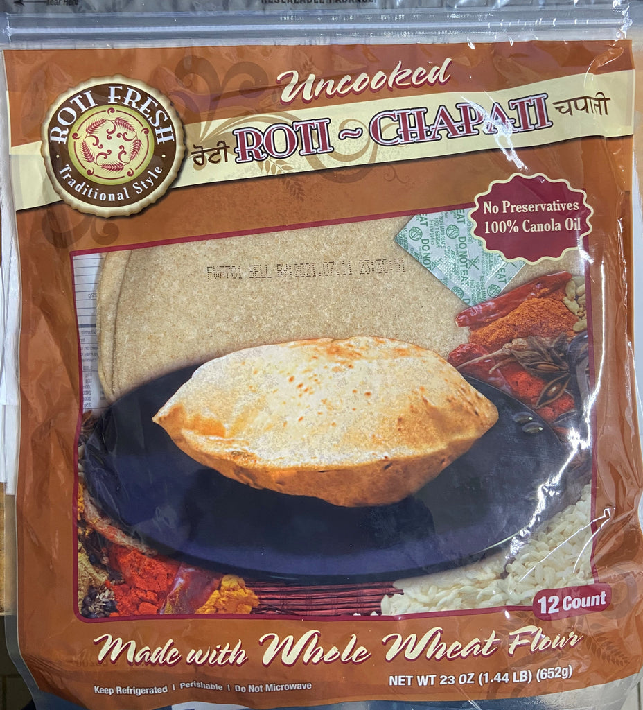Making Roti Indian Chapati on Roti Tawa Made of Wheat Stock Image